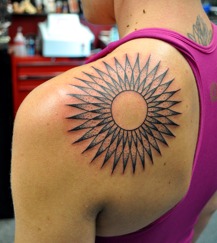Geometric Tattoo on a shoulder blade 