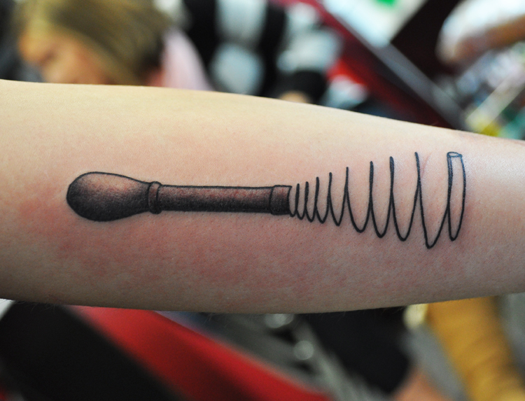 tattoo of a chefs whisk 