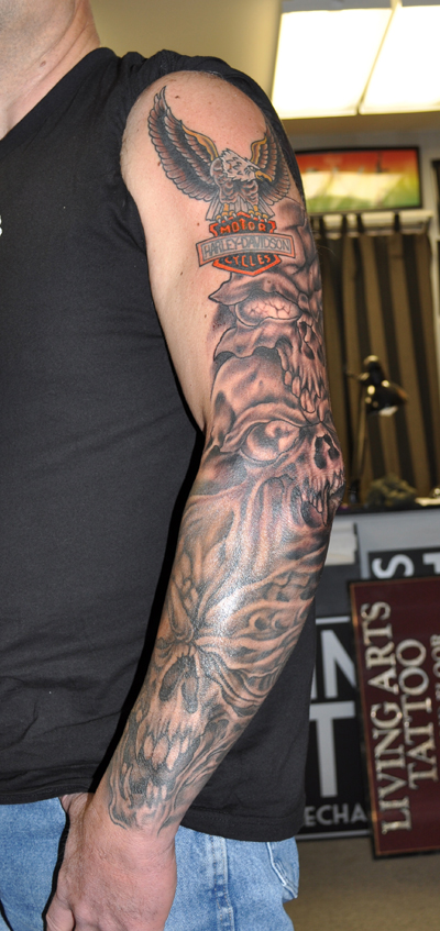 Tattoo of skulls on Arm 